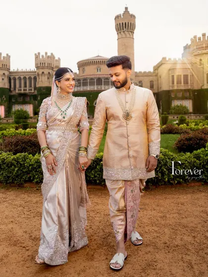 Creating coordinated outfits for couples is one of my greatest joys. This stunning pair is dressed in complementary pastel ensembles, with the bride in a hand-embroidered saree and the groom in a matching silk kurta set, perfect for their pre-wedding photoshoot.
