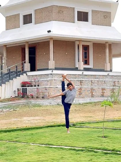 Another view of Trivikrama-asana, capturing the full extension and balance of the pose. The story of the dwarf Vamana growing into a giant reminds us of our own limitless potential when we align with a higher purpose.