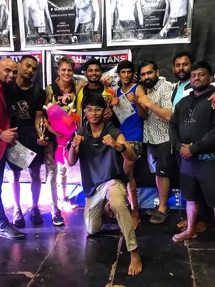 The team celebrating wins at the Art of Combat event in Goa. We travel together, we fight together, and we win together.