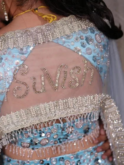 We even personalized her dupatta with her wedding hashtag 'SuVish', embroidered with sparkling beads.