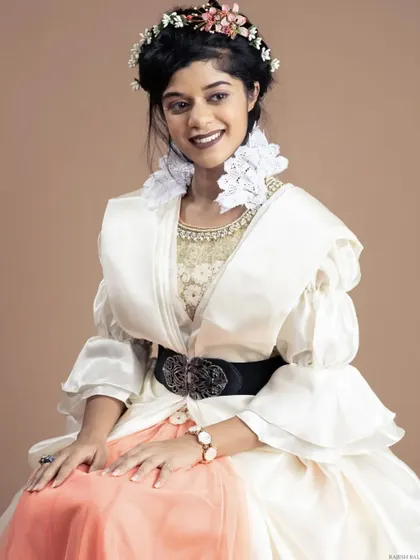For this vintage-inspired editorial, I created a look with a dark lip and soft, natural skin. The floral hair accessory and period styling required makeup that felt both authentic and beautiful.