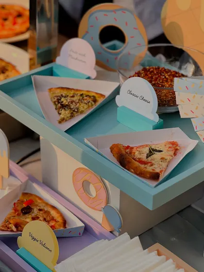 A live pizza station was another feature of the ice cream party, offering savory options like classic cheese and veggie volcano slices.