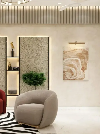 Another angle of this bold living space, showing how we balance statement pieces like the red sofa with softer elements like the curved armchair and abstract art, creating a cohesive and curated look.