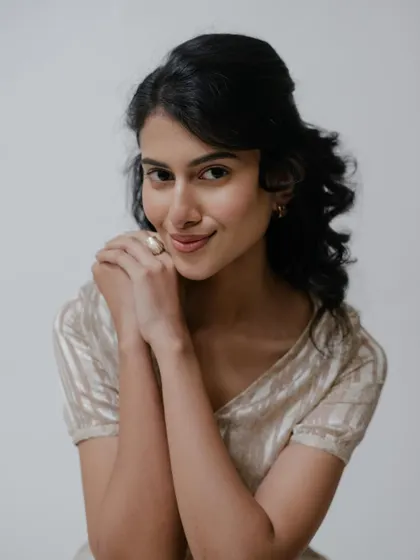 A soft and gentle look with subtle makeup and softly styled hair. This is perfect for capturing a serene and approachable mood.