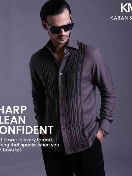Sharp, clean, confident. This grey shirt embodies quiet power in every thread, creating clothing that speaks for you when you don't have to.