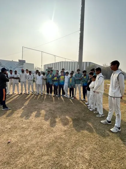 An early morning strategy talk on the field. We ensure our players not only practice their skills but also understand the tactical side of the game.