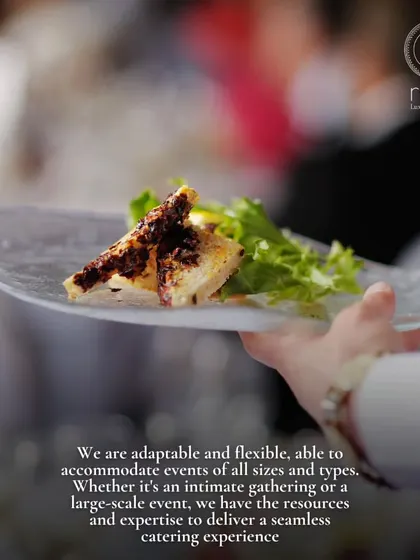 We are adaptable and flexible, able to accommodate events of all sizes. A server holds a single, beautifully crafted appetizer on a clear plate, symbolizing our attention to individual guest experiences.