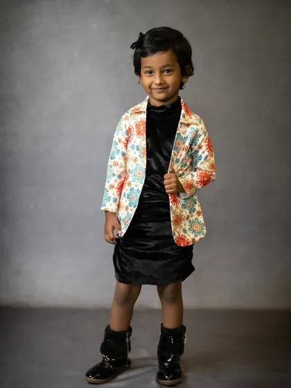 A stylish portrait of a confident young girl. We also photograph older kids, capturing their unique personality in a more classic portrait style.