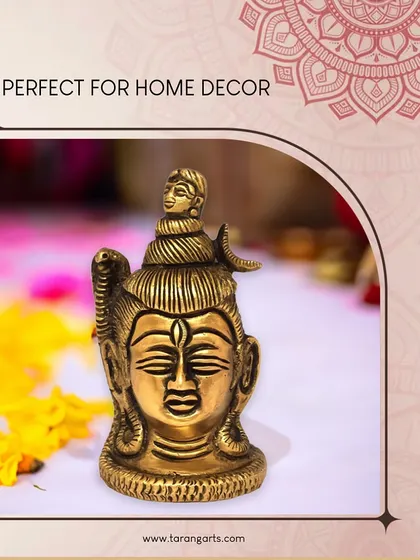 This brass Shiva head statue is a symbol of strength, wisdom, and serenity. Handcrafted with premium brass, it's a perfect addition to a home temple or meditation space.