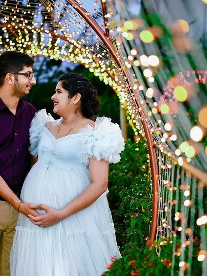 This is one of my favorite kinds of shots to create. The fairy lights add such a magical, dreamy feel to this beautiful moment for the expecting couple.