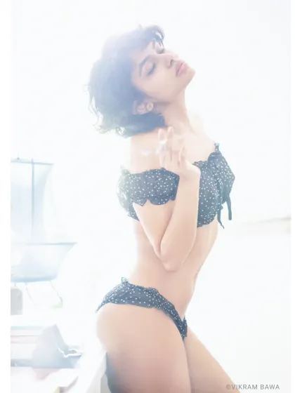 The absolutely vivacious Lachugram in a high-key studio setup. The overexposed background creates a dreamy, ethereal effect that is perfect for beauty and glamour shots.