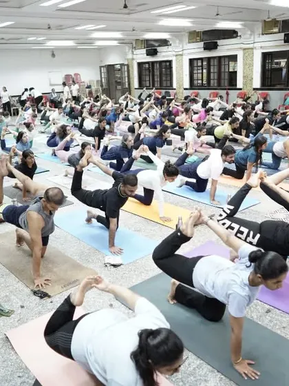 Students moving together in sync during our International Yoga Day event. The collective energy was incredible.