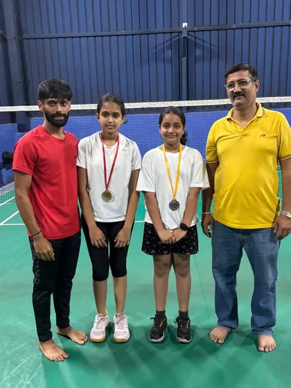 Our girl players showcasing their medals after a successful tournament performance. We are committed to nurturing talent in both boys and girls at our academy.