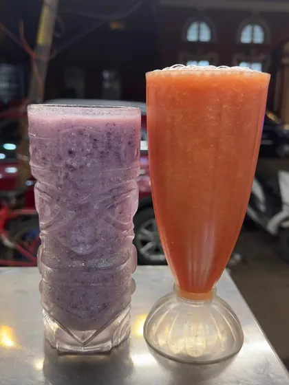 A close-up of my grape juice and watermelon juice, two of my most popular refreshing drinks.