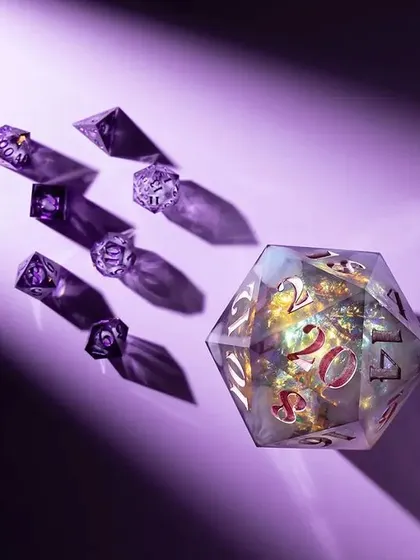 An abstract and artistic shot for Wild Earth Dice. We used a projector to cast dramatic shadows from the dice onto a rich purple background, creating a mysterious and visually captivating image.