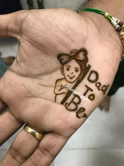 Mehndi for the dad-to-be! This cute little design is a fun way for fathers to join in on the baby shower celebrations.