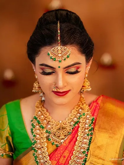 An intimate close-up on the model's face, focusing on the artistry of the bridal makeup.