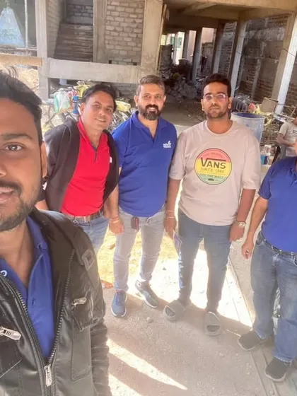 Our team with customers at a construction site. We work with you from the ground up to integrate solar into your new home.