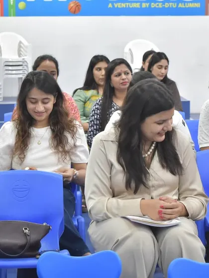 Parents attentively listening and taking notes during our orientation program. We believe in open communication and partnership with parents to support each child's learning journey.