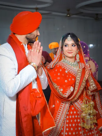 A beautiful, candid interaction between the bride and groom during the ceremony.