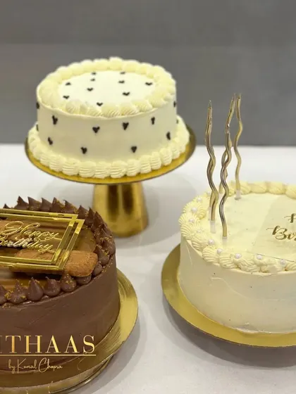 A beautiful trio of my custom birthday cakes. Each one is unique, from a heart-patterned vanilla cake to a rich Biscoff chocolate creation, ready to make someone's special day unforgettable.