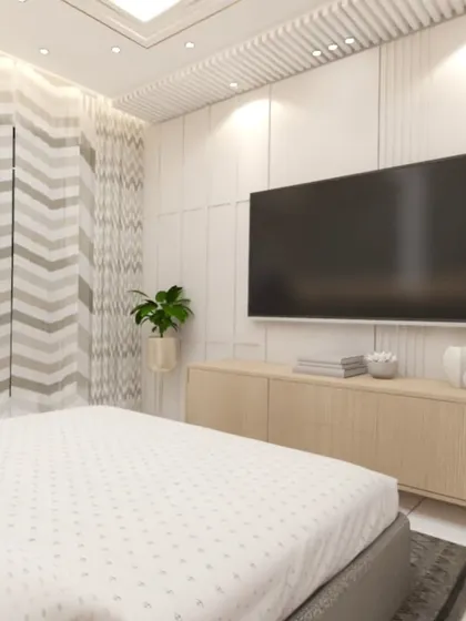 This bedroom view focuses on the TV unit, which features natural wood tones and a clean design. The chevron-patterned curtains add a subtle graphic element to the serene space.