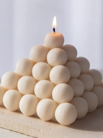 My big pyramid bubble candle is a unique, sculptural piece that makes a statement. It's a great gift for someone who loves modern, aesthetic decor.