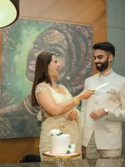 The cake cutting ceremony at an engagement party. This is a classic moment, and I capture it candidly to preserve the genuine smiles and excitement.