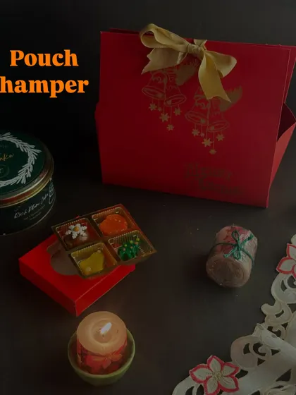 The Pouch Hamper, a slightly larger version that's perfect for gifting to colleagues or friends. It's a thoughtful way to share some festive sweetness.