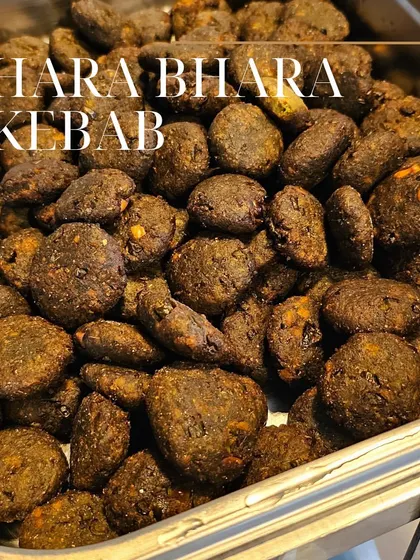 Our Hara Bhara Kebabs are a signature vegetarian starter. Made with spinach, peas, and potatoes, these flavorful patties are a healthy and delicious way to begin any meal.
