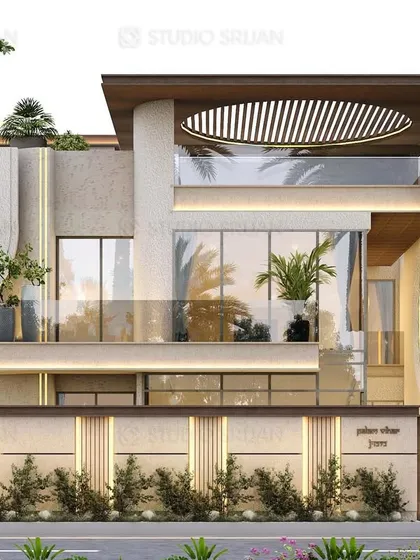 The front view of the Palam Vihar home, showing how vertical lighting strips and a slatted pergola on the terrace add detail and elegance. The boundary wall design continues the architectural language of the main building.