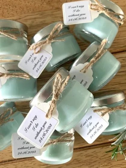 These mini jar candles with "I can't say I do without you" tags are a perfect gift for bridesmaids or as part of a wedding invitation hamper.