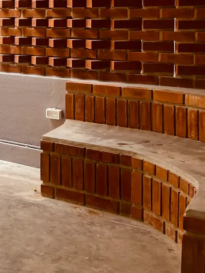 A detail shot of the curved brick bench we built. The vertical orientation of the bricks creates a unique texture and follows the smooth curve of the seat.