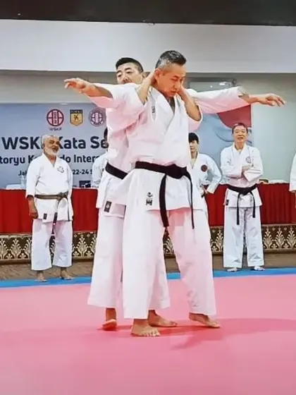 A Japanese master demonstrating a complex takedown and restraint technique during the WSKF Kata Seminar. These are the skills we aspire to learn.