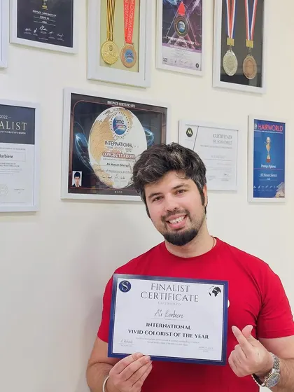 Holding the finalist certificate for the International Vivid Colorist of the Year award. Every recognition fuels my passion to keep pushing the limits of hair artistry for my clients.