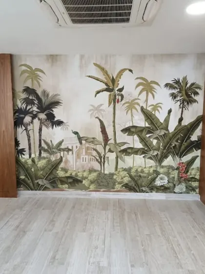 This room features a full-wall tropical jungle mural that pairs beautifully with the wooden cabinetry. The design creates an immersive, natural escape, making the space feel both expansive and cozy.