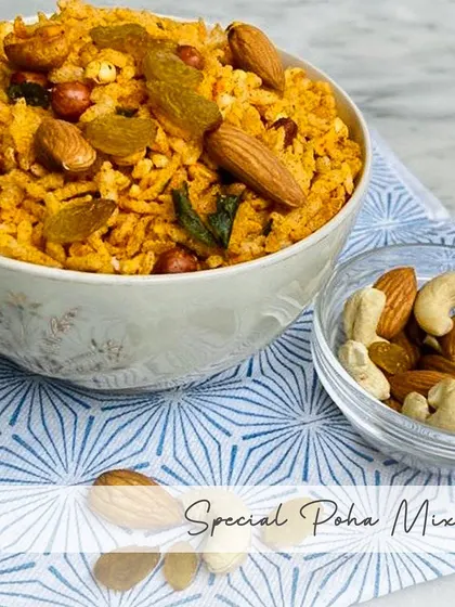 My Special Poha Mixture contains poha, raisins, cashews, almonds, peanuts, curry leaves, hing, and red chillies. It's a rich and flavorful blend.