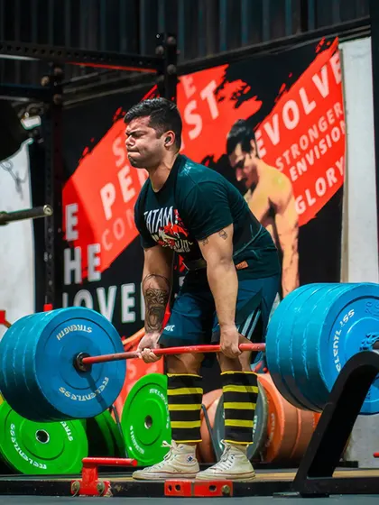 Another client pulling a heavy deadlift in the gym. The expression says it all. Pushing your limits safely is what leads to these significant strength gains.