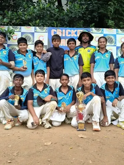 Our Summer Camp 2025 team posing with their trophies after a successful tournament run.