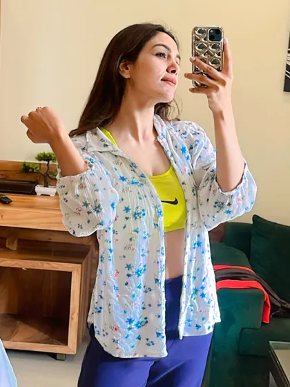 A mirror selfie showing off a casual, post-workout look. Comfort and style can definitely go together.