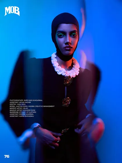 A page from our "Neo-Baroque Noir" story in MOB Journal. The lighting uses colored gels to create a futuristic, avant-garde mood.