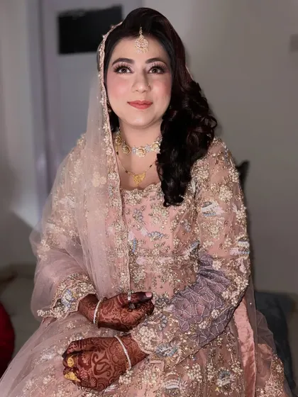 A happy and confident Walima bride. The makeup is designed to last through the night while feeling lightweight and comfortable.