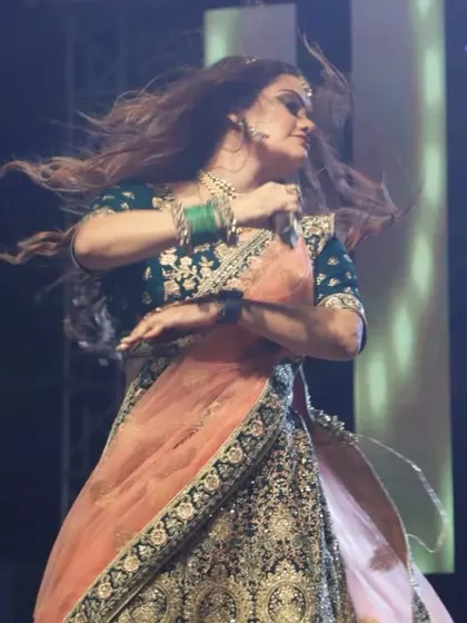 Lost in the moment while dancing during a Garba performance. The music truly takes over.