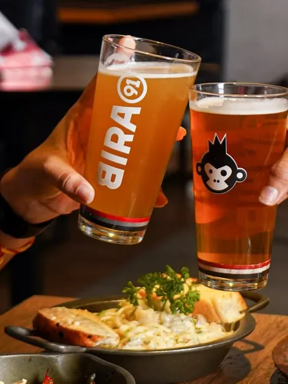 A classic "cheers" moment captured for Bira91. This style of lifestyle photography connects the product with social experiences, making it relatable and aspirating for customers.