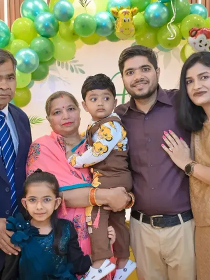 A multi-generational family portrait at a child's birthday party. We make sure to get photos that include grandparents and other extended family members.