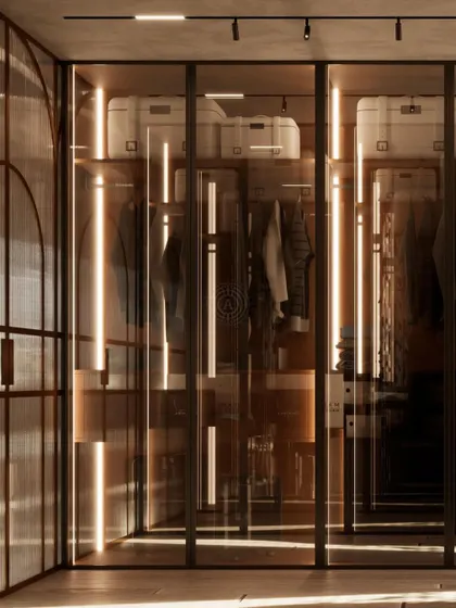 Render of a massive walk-in wardrobe with reflective tinted glass doors and integrated lighting. The design plays with different materials to create a modern and sleek finish.