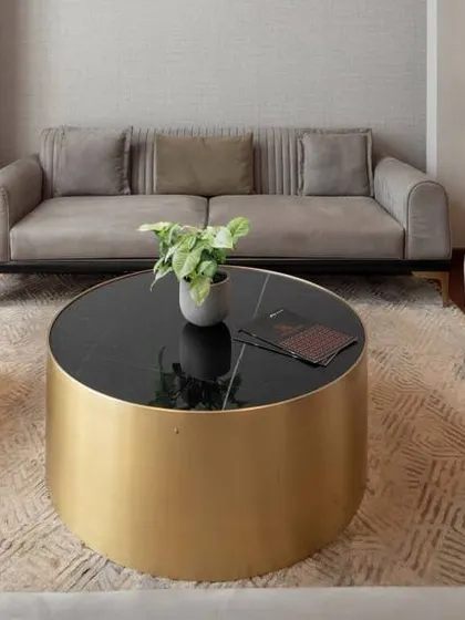 The discussion lounge at the Godrej South Estate Experience Centre is a study in quiet luxury. A neutral color palette, plush seating, and metallic accents create a comfortable and sophisticated environment for client conversations.