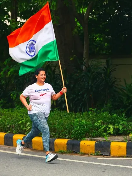 The 'Chak De' moment. A member of our squad running with the Indian flag, full of pride and energy during our Independence Day themed run.