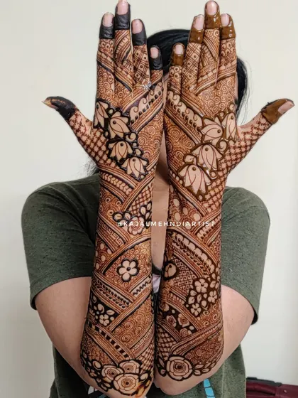 A beautiful example of full coverage bridal henna with bold, clear patterns that create a striking effect.