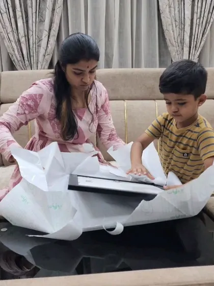 The unboxing of a mother and son portrait. It’s a special moment when the wrapping paper comes off and the art is revealed for the first time.